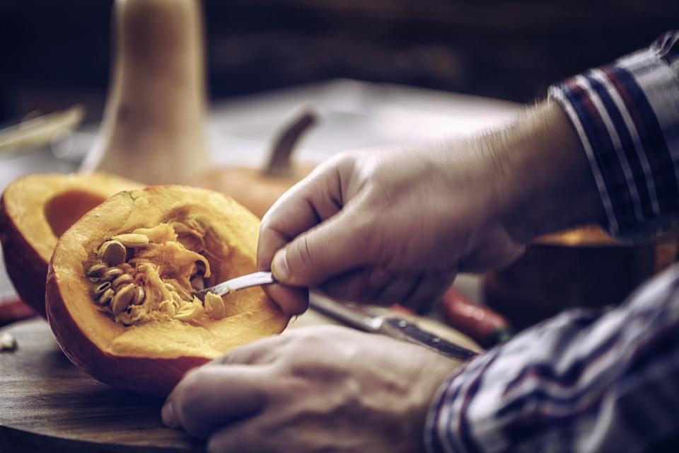 preparing and cutting fresh pumpkins for autumn days