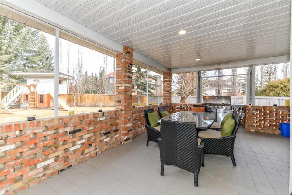 <p><span>242 Wolf Ridge Close Northwest, Edmonton, Alta.</span><br>Outside is a fully screened patio area, with a second open-air patio area beside.<br>(Photo courtesy Zoocasa) </p>