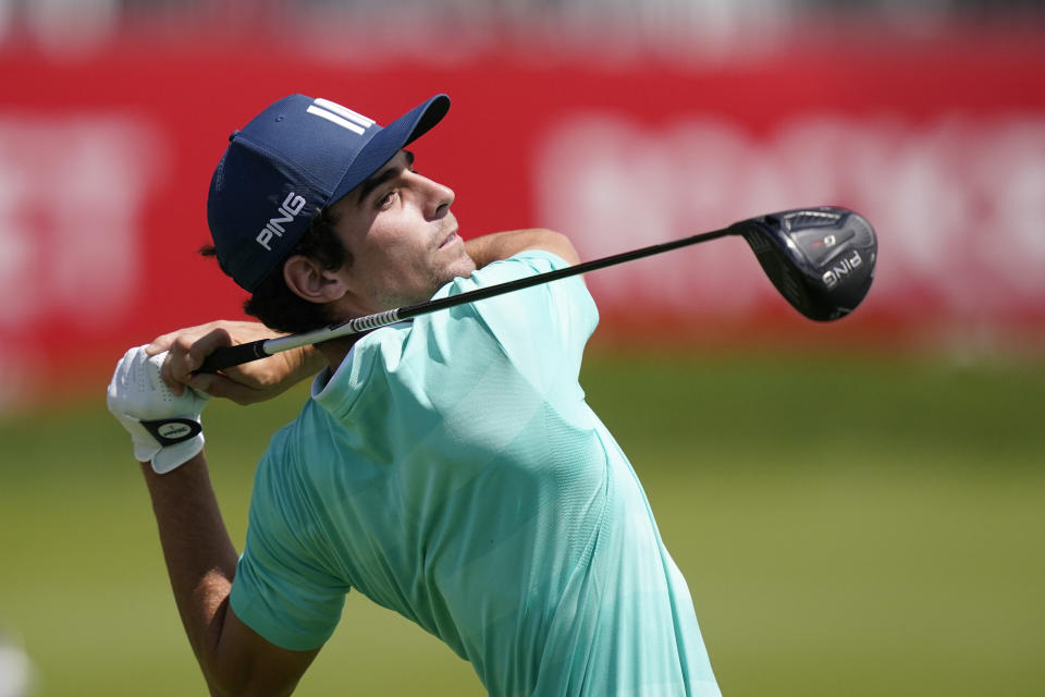 Joaquin Niemann of Chile drives on from the 16th tee during the second round of the Rocket Mortgage Classic golf tournament, Friday, July 2, 2021, at the Detroit Golf Club in Detroit. (AP Photo/Carlos Osorio)