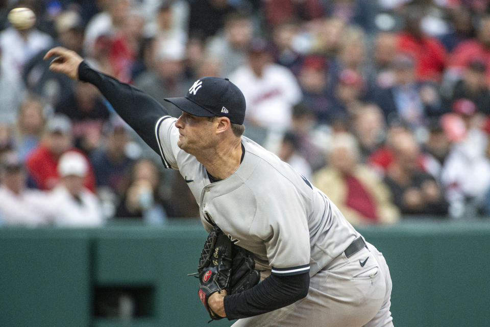 New York Yankees starting pitcher Gerrit Cole delivers against the Cleveland Guardians during the fourth inning of a baseball game in Cleveland, Tuesday April 11, 2023. (AP Photo/Phil Long)