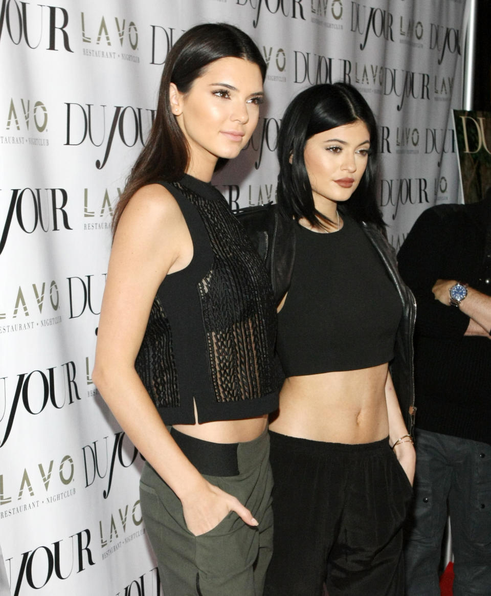 NEW YORK, NY - AUGUST 28: Kendall Jenner and Kylie Jenner attend DuJour Magazine Celebrates Kendall & Kylie Jenner at Lavo on August 28, 2014 in New York City.  (Photo by Bennett Raglin/WireImage)