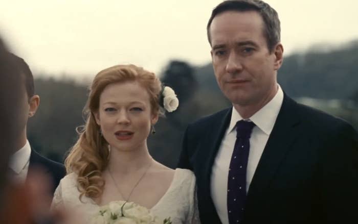 Wedding scene featuring Sarah Snook in a wedding dress with a floral headpiece and Matthew Macfadyen in a suit and tie