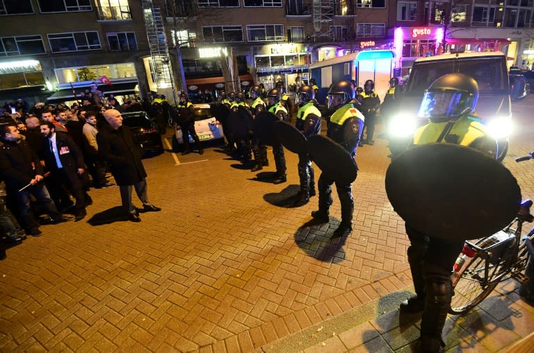 Police forcefully dispersed protesters after several hours of a demonstration by more than 1,000 people outside the Turkish consulate in Rotterdam on March 11, 2017