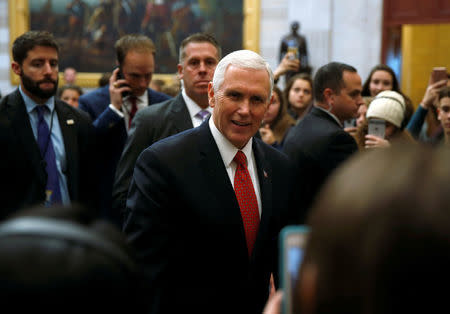 FILE PHOTO - U.S. Vice President Mike Pence greets students after meeting with Senate Republicans on Capitol Hill in Washington, U.S., January 9, 2018. REUTERS/Joshua Roberts