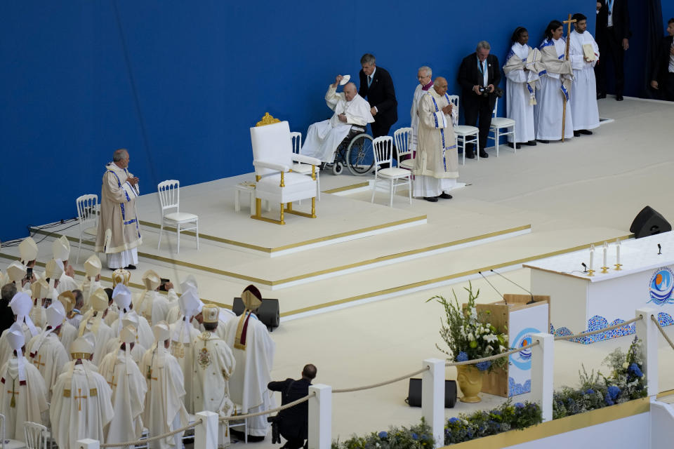 Pope Francis arrives at the "Velodrome Stadium", in Marseille, France, to celebrate mass, Saturday, Sept. 23, 2023. Francis, during a two-day visit, will join Catholic bishops from the Mediterranean region on discussions that will largely focus on migration. (AP Photo/Pavel Golovkin)