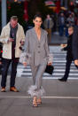 <p>Why wear a plain trouser suit when you can wear Prada’s, feather-embellished version? <em>[Photo: Getty]</em> </p>