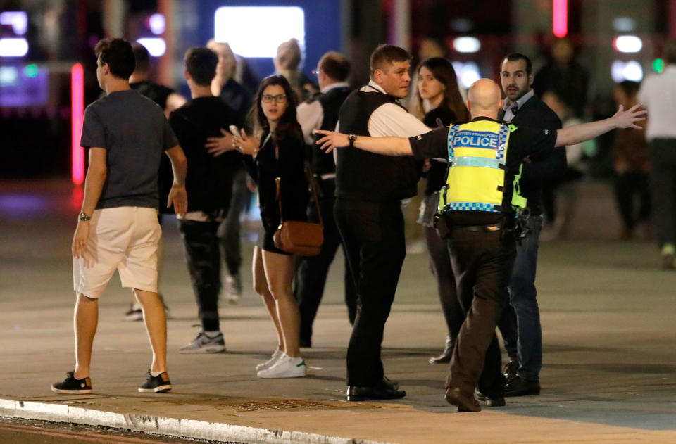 <p>A Police officer clears people away from the area near London Bridge after an incident in central London, late Saturday, June 3, 2017. British police said they were dealing with “incidents” on London Bridge and nearby Borough Market in the heart of the British capital Saturday, as witnesses reported a vehicle veering off the road and hitting several pedestrians. (AP Photo/ Matt Dunham) </p>