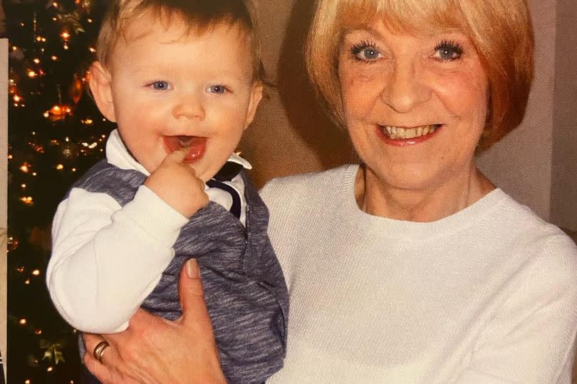 Pat with her grandson when he was a baby