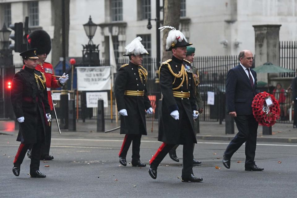 Defence Secretary Ben Wallace lays a wreath at the Centotaph, Whitehall, London, to mark VJ Day (PA)