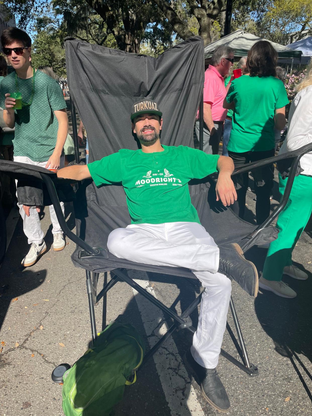 Hill Lawrence relaxes in his oversized chair on Liberty Street.