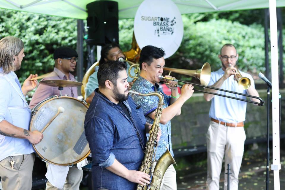 Sugartone Brass Band played live music.