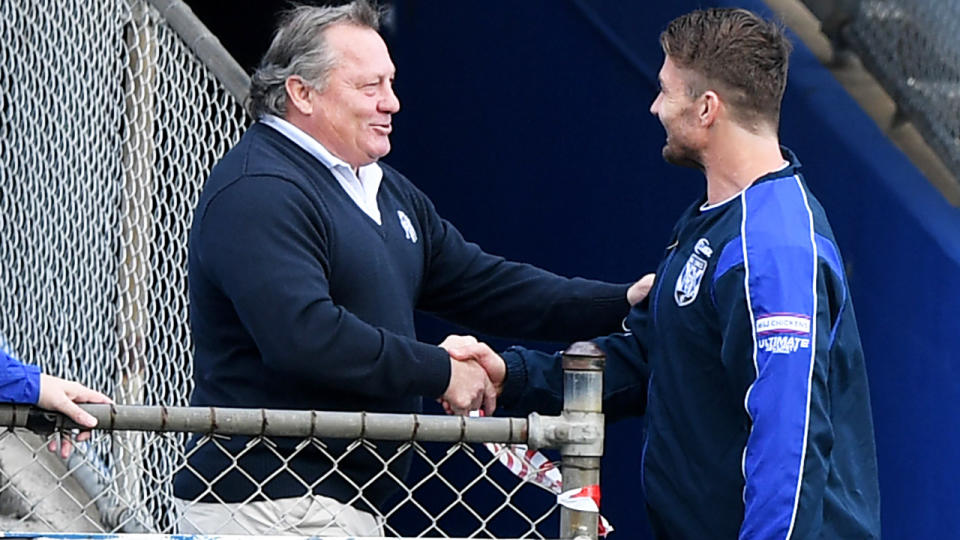 Terry Lamb, pictured here greeting Kieran Foran at a Canterbury-Bankstown Bulldogs training session.