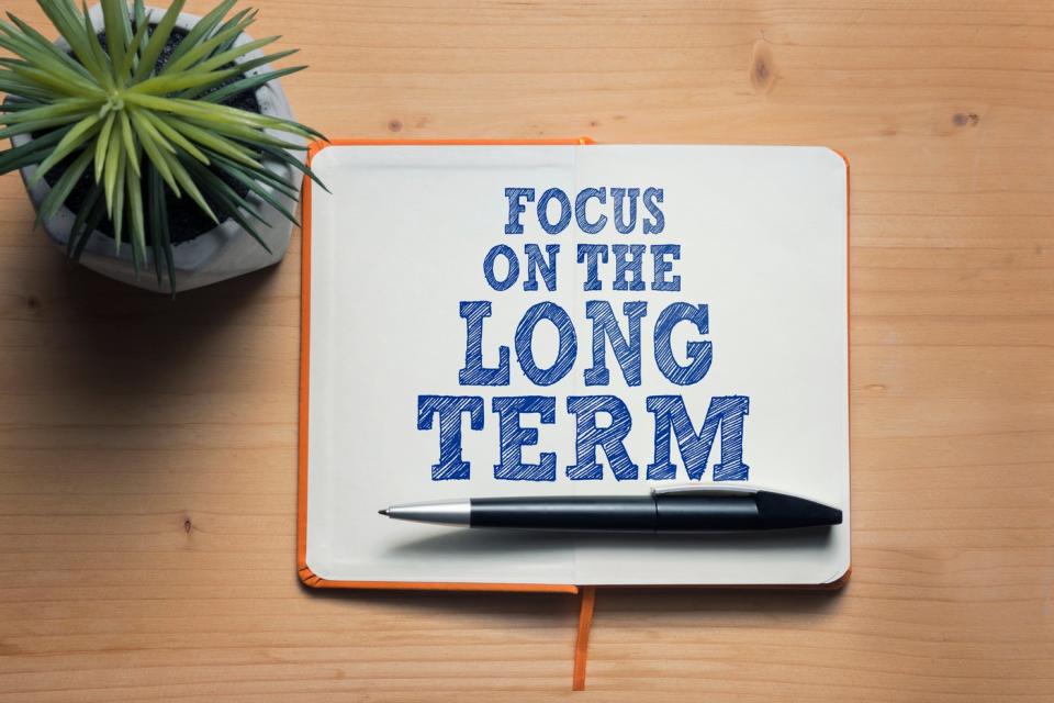 Book notes saying Focus On The Long Term