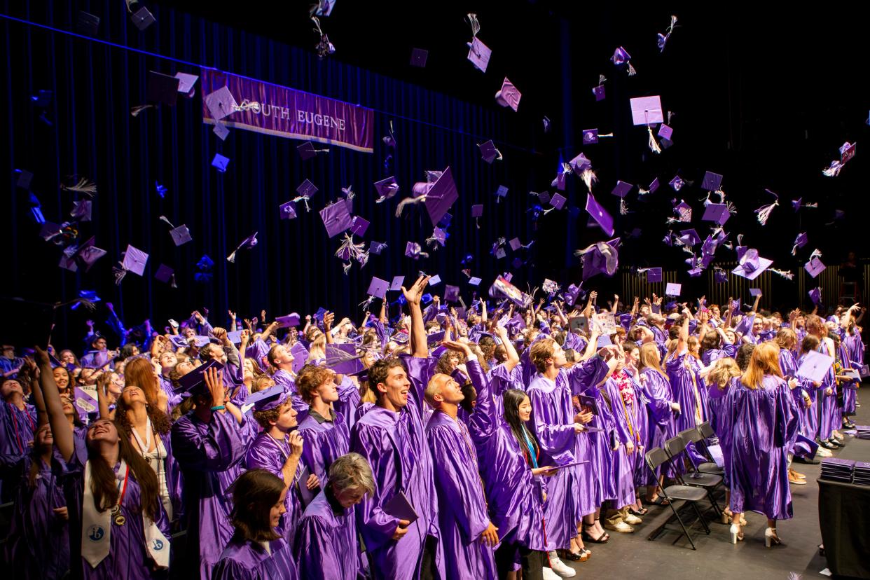 Graduates toss their mortarboards during South Eugene High School’s June 13 commencement ceremony.