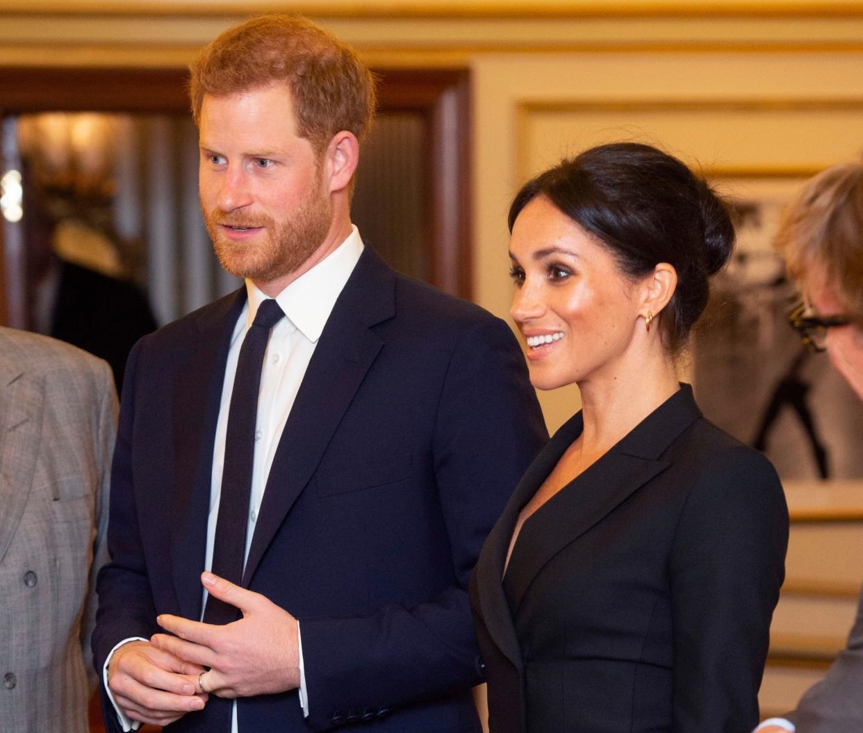 Prince Harry and Meghan Markle arrive at the Victoria Albert Theatre. [Photo:Rex]