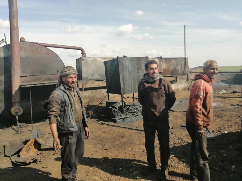 <div class="inline-image__caption"><p>Maher Joumaa Howair, Ahmad Abu Mohamad, and an unidentified oil refinery worker. </p></div> <div class="inline-image__credit">Kenneth R. Rosen</div>