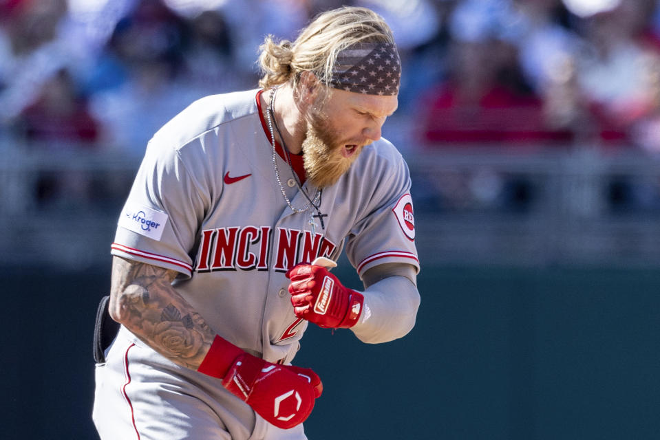 Cincinnati Reds' Jake Fraley reacts after he hit a three run home run in the ninth inning of a baseball game against the Philadelphia Phillies, Sunday, April 9, 2023, in Philadelphia. (AP Photo/Laurence Kesterson)