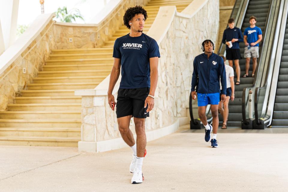 Xavier's Desmond Claude (left) and Quincy Olivari (right) walk to the arena before playing in the Baha Mar Hoops Summer League in Nassau, Bahamas on Aug. 8, 2023.