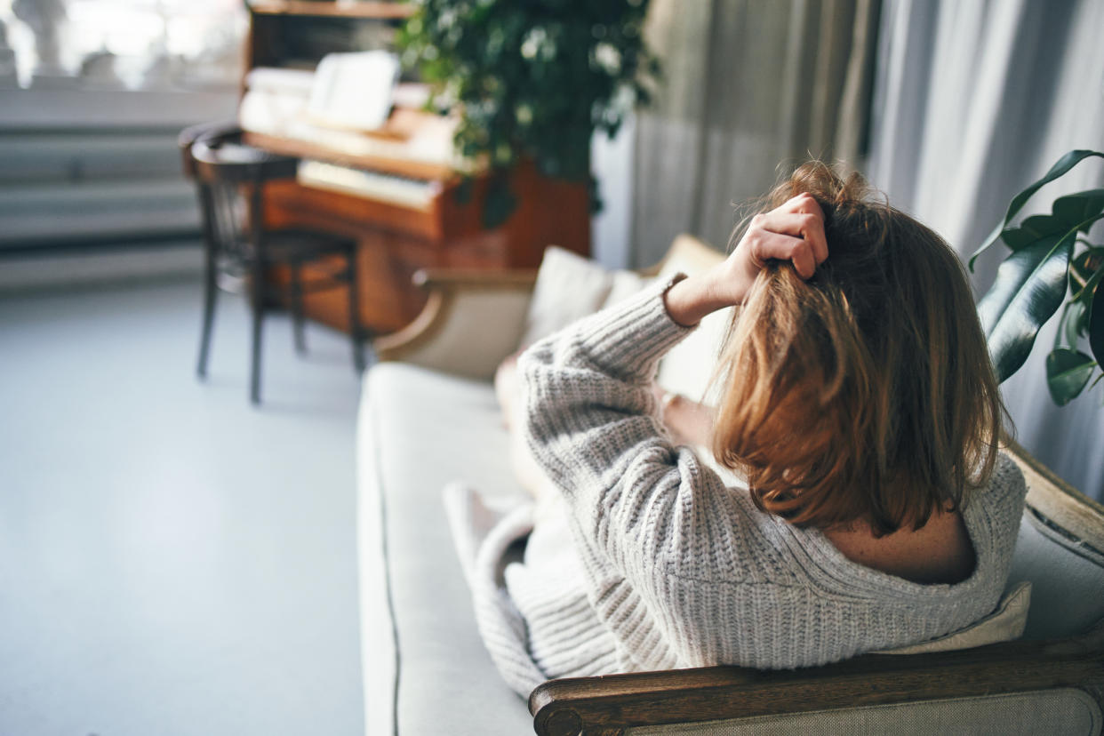 Woman suffering from heartbreak. (Getty Images)