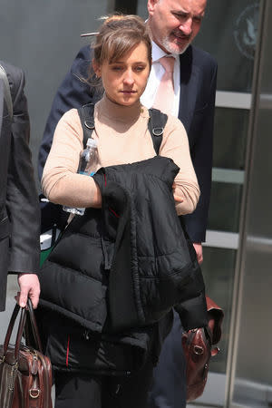 Actress Allison Mack departs the Brooklyn Federal Courthouse after facing charges regarding sex trafficking and racketeering related to the Nxivm cult case in New York, U.S., April 8, 2019. REUTERS/Shannon Stapleton