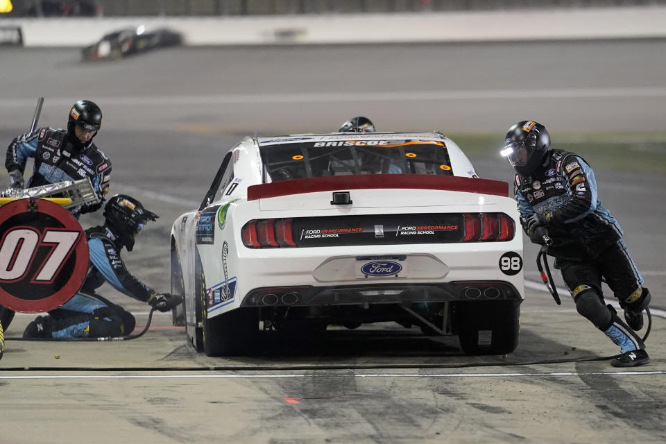 Chase Briscoe (98) pits during a NASCAR Xfinity Series auto race at Kansas Speedway in Kansas City, Kan., Saturday, Oct. 17, 2020. (AP Photo/Orlin Wagner)