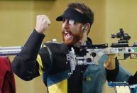 Shooting - Gold Coast 2018 Commonwealth Games - Men's 10m Air Rifle - Final - Belmont Shooting Centre - Brisbane, Australia - April 8, 2018. Dane Sampson of Australia celebrates winning the gold. REUTERS/Eddie Safarik