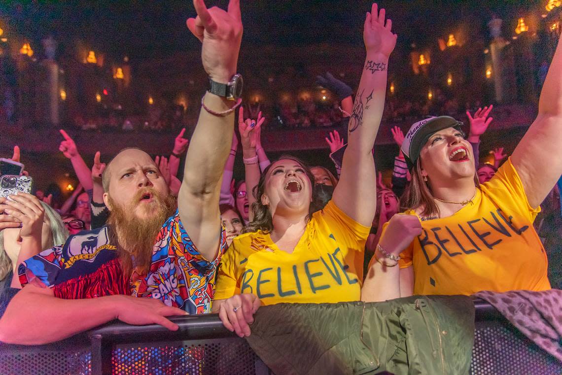 Fans, some wearing “Ted Lasso” “Believe” shirts, get into the performances at the Thundergong! fundraiser show.