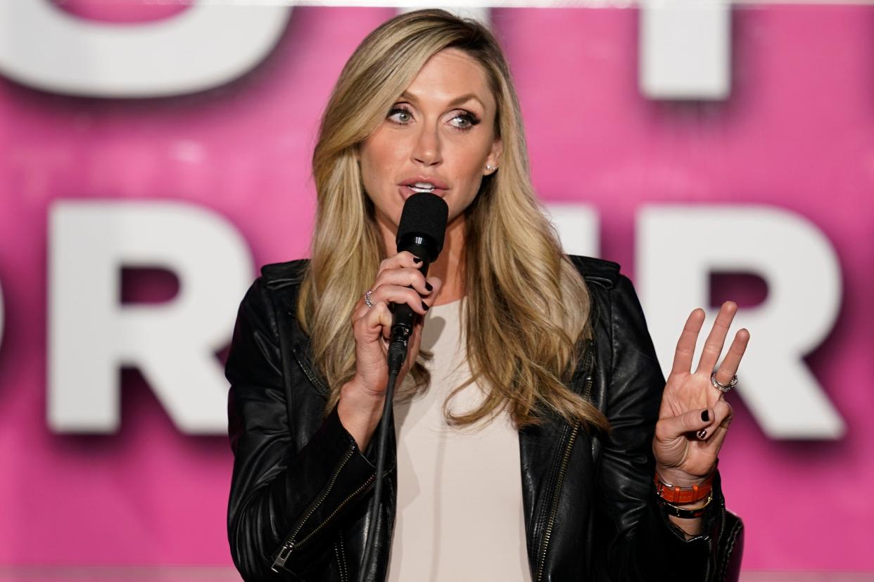 Lara Trump speaks to a crowd during a campaign rally on a Women for Trump Bus Tour campaign event on 8 October 2020. (AP)