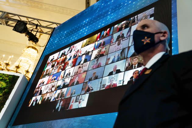 World leaders are displayed on a screen in the East Room of the White House during the virtual Leaders Summit on Climate in Washington, DC, USA, 23 April 2021. The meeting is intended to underline the urgency and economic benefits of stronger climate action on the road to the United Nations Climate Change Conference (COP26) in Glasgow in November 2021 (Photo: ANNA MONEYMAKER EPA)