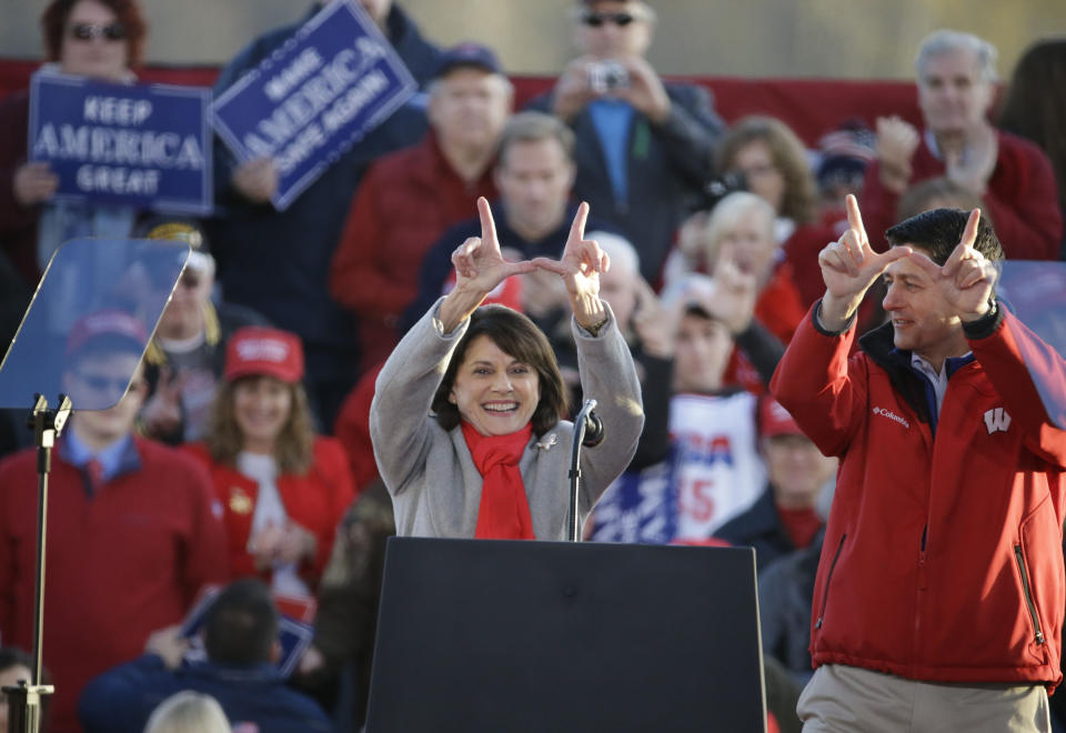 Senate candidate, current Wisconsin State Senator Leah Vukmir R-Wis. and House Speaker Paul Ryan make "W" hand signs for Wisconsin during a rally Wednesday, Oct. 24, 2018, in Mosinee, Wis. The rally will be headlined by President Donald Trump. (AP Photo/Mike Roemer)