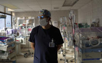 Pediatrician Dr. Hugo Tejerina stands in the intensive care unit of the Women's Hospital maternity ward in La Paz, Bolivia, Thursday, Aug. 13, 2020. Tejerina said oxygen reserves for the infants were almost exhausted last weekend due to nationwide blockades by supporters of the party of former President Evo Morales who object to the recent postponement of elections, but supplies arrived by plane at the last minute. Bolivia's political and social crisis is coinciding with the continued spread of the new coronavirus. (AP Photo/Juan Karita)