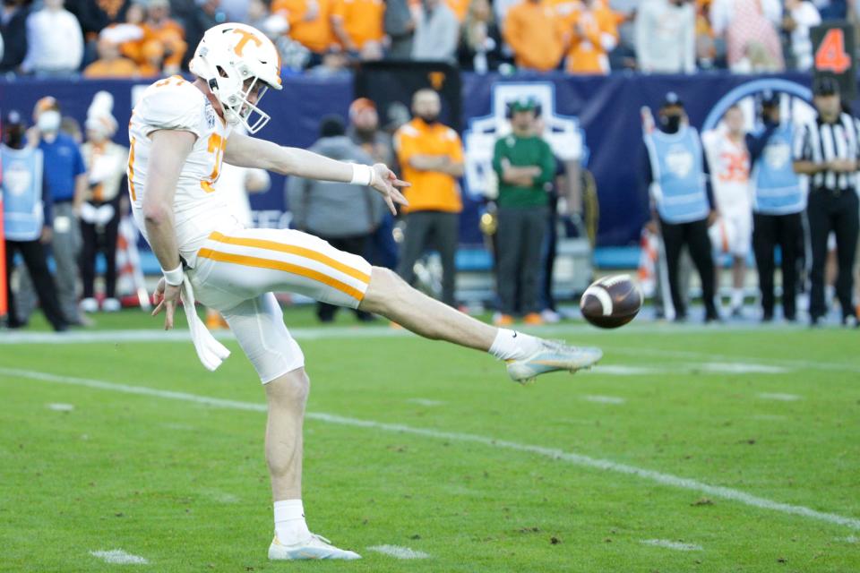 Tennessee punter Paxton Brooks (37) punts during the second quarter of the Music City Bowl, Thursday, Dec. 30, 2021, at Nissan Stadium in Nashville.