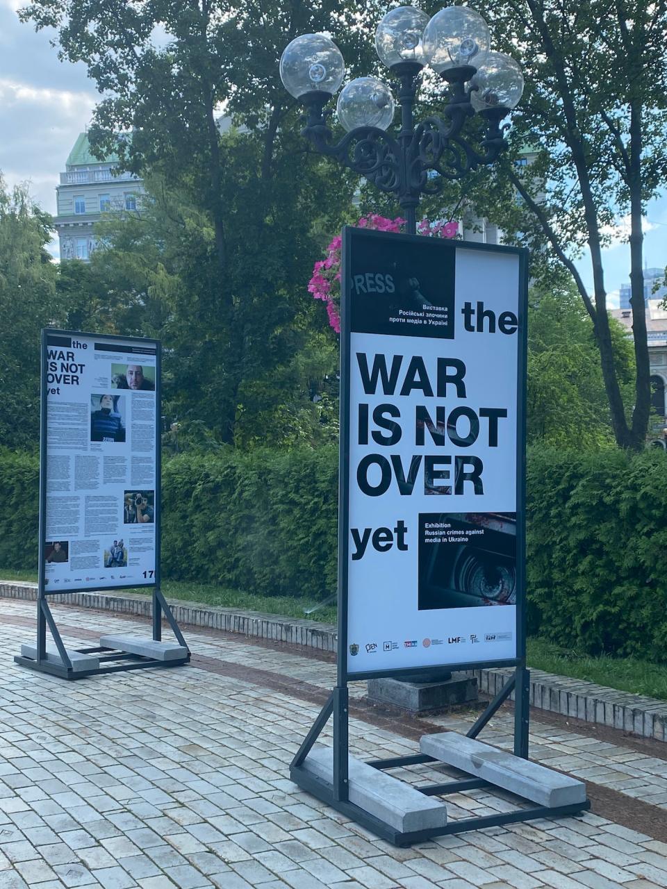 A sign that says "the war is not over yet"