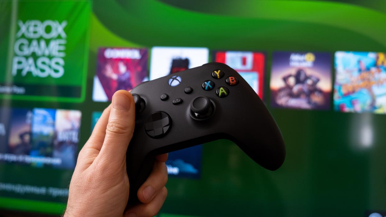  An image of an Xbox controller and Xbox Game Pass. 