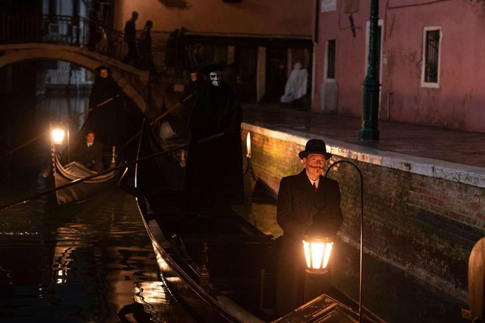 (L-R): Riccardo Scamarcio as Vitale Portfoglio and Kenneth Branagh as Hercule Poirot in 20th Century Studios' A HAUNTING IN VENICE. Photo by Rob Youngson. \u00a9 2023 20th Century Studios. All Rights Reserved.