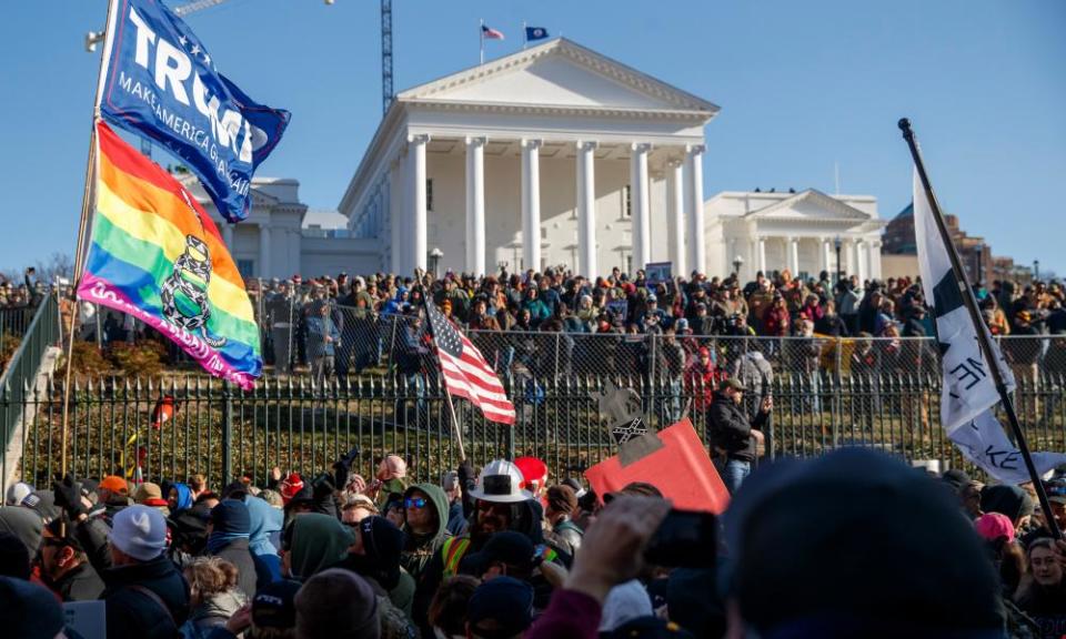 Guns rights supporters gather outside the state capitol in Richmond, Virginia, on 20 January.