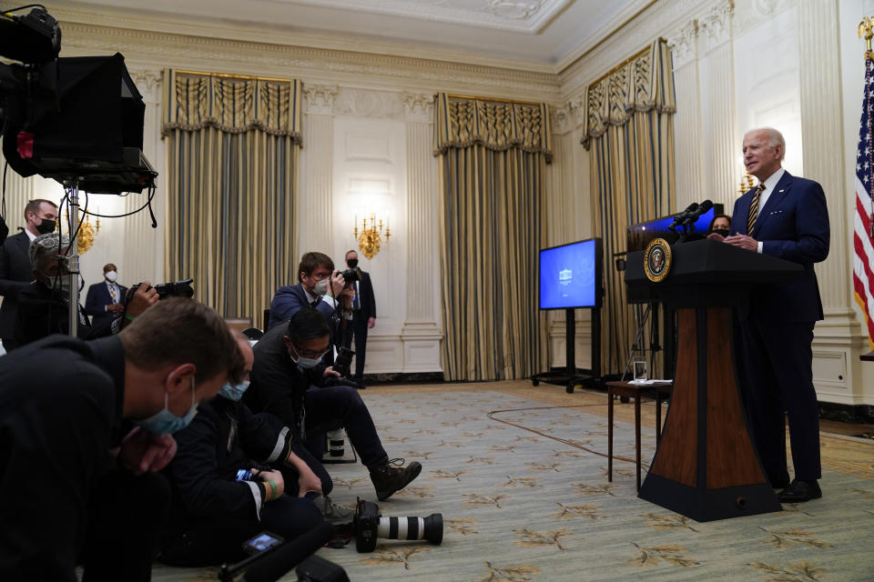 President Joe Biden delivers remarks on the economy in the State Dining Room of the White House, Friday, Jan. 22, 2021, in Washington. (AP Photo/Evan Vucci)