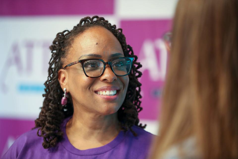 Kentucky representative Attica Scott talks with Beth Bissmeyer during a meet and greet.  Scott announced Wednesday, July, 7, 2021 that she will challenge incumbent John Yarmuth in 2022.