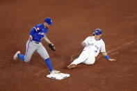 Kansas City Royals second baseman Michael Massey (19) forces outs Toronto Blue Jays' Daulton Varsho (25) to end the fourth inning of a baseball game in Toronto, Wednesday, May 1, 2024. (Chris Young/The Canadian Press via AP)