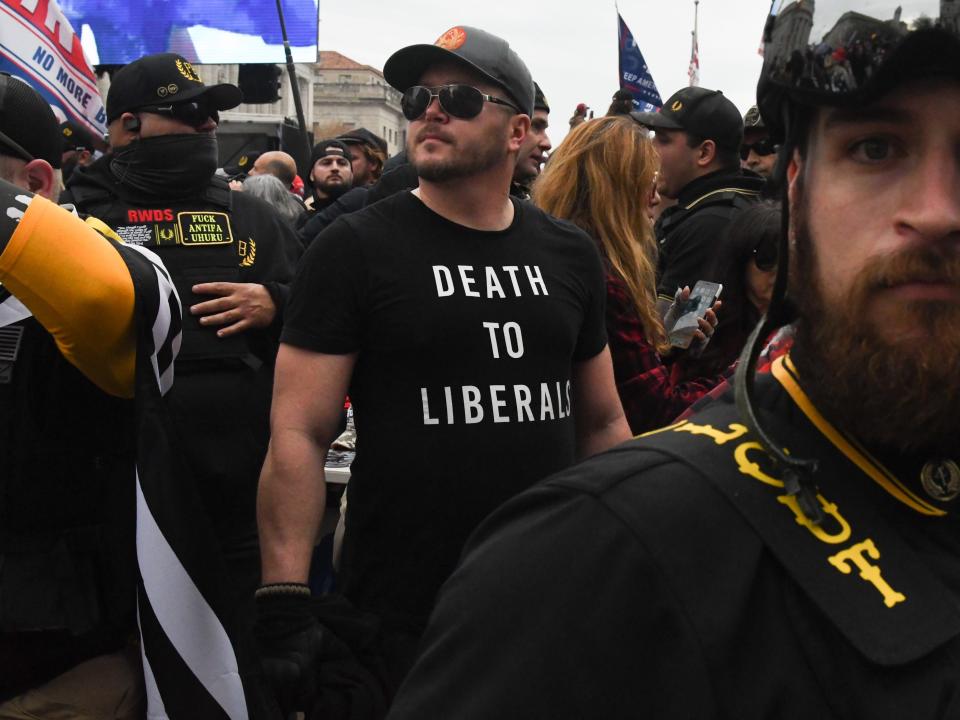 proud boy in shirt that says "death to liberals"