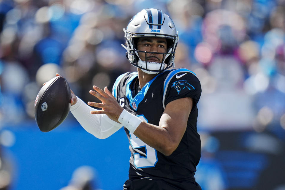 Carolina Panthers quarterback Bryce Young (9) works against the Houston Texans during the first half of an NFL football game, Sunday, Oct. 29, 2023, in Charlotte, N.C. (AP Photo/Rusty Jones)