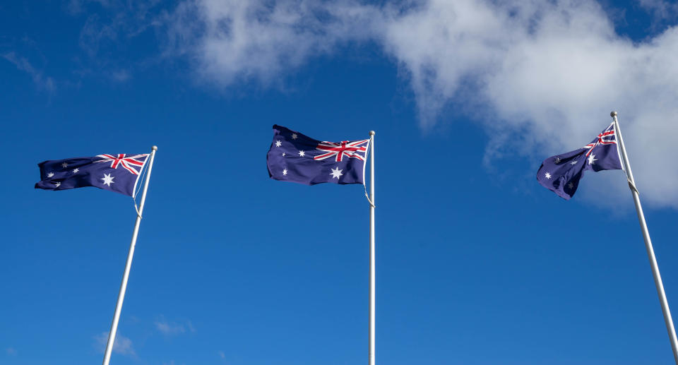 Australian flags on flag poles.