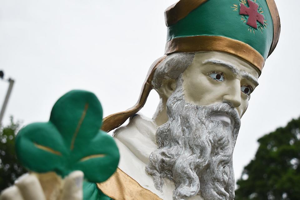 The statue of St. Patrick outside the Somerset Church that will be merged with St. Louis de France and St. Thomas More churches.