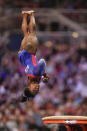 <p>Simone Biles competes on the vault during the women’s U.S. Olympic Gymnastics Trials on June 25, 2021, in St. Louis. </p>