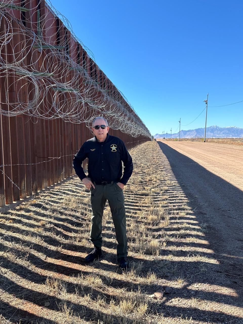 Martin County Sheriff Will Snyder stands at the border of Cochise County, Arizona, and Mexico. He was invited by Mark Dannels, sheriff of Cochise County, to visit Feb.13-16, 2024, and get a detailed briefing on the implications of the open border.