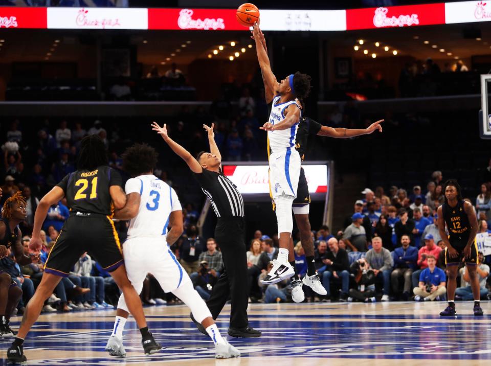 The Memphis Tigers forward DeAndre Williams (12) wins the tip against the ECU Pirates in a basketball game on Jan. 7, 2022 at the Fedex Forum in Memphis. 