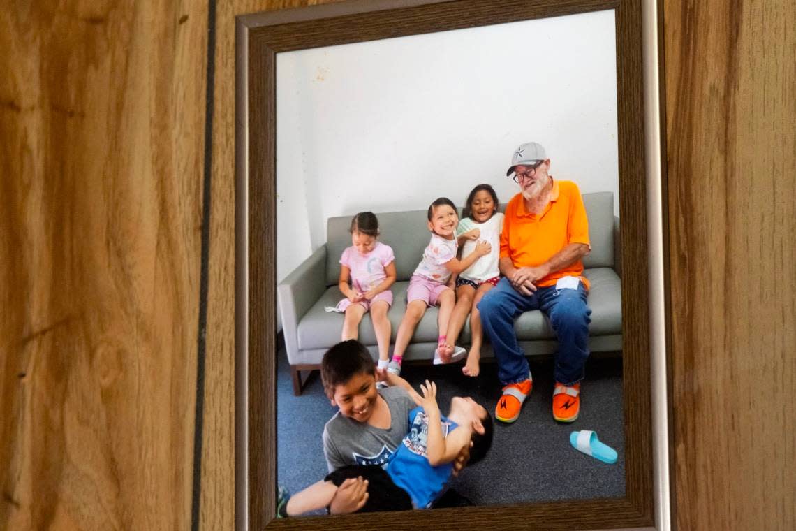 A photo inside Charles Parson’s home that shows him with Cindy Rodriguez-Singh’s children, including Noel Rodriguez-Alvarez in the blue shirt, in Everman, Texas, on Tuesday, March 28, 2023. Noel has not been seen since November, and police thoroughly searched the home during their investigation. Madeleine Cook/mcook@star-telegram.com