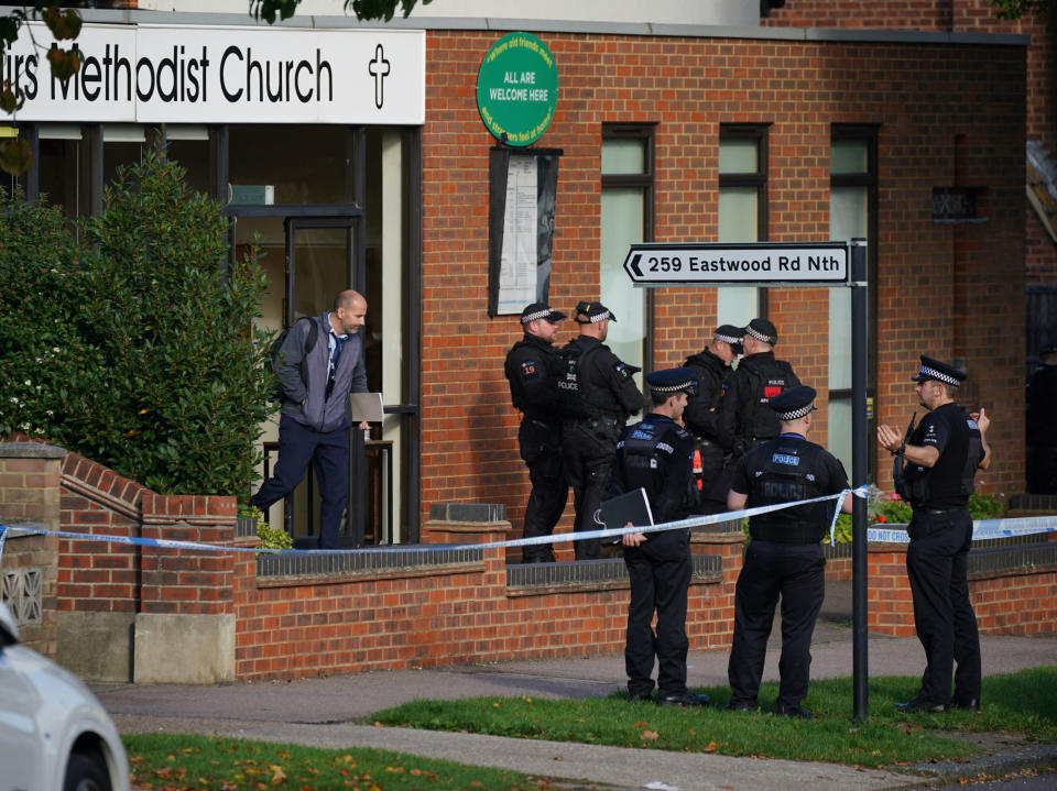 Police officers outside Belfairs Methodist Church in Leigh-on-Sea (PA)