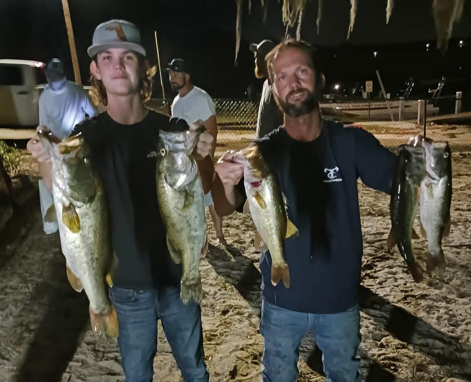 Anthony Carnley, left, and Billy Carnley had 14.12 pounds and big bass with a 6.36 pounder to win the Thursday Night Open Series tournament May 5 at Lake Alfred. 