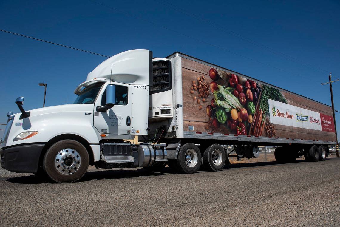 A truck drives past the Yosemite Wholesale Distribution Center located at 2674 E. Vassar Avenue in Merced, Calif., on Wednesday, Sept. 4, 2024. Save Mart confirmed the planned closure of the facility in a statement sent to the Merced Sun-Star.